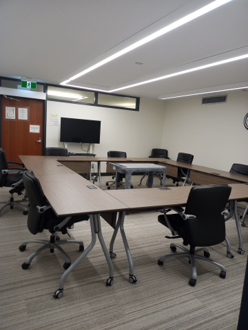 Boardroom with tables and chairs